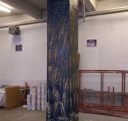 FRP karbon fiber kaplama uygulanmış betonarme kolonun güçlendirme sonrası görünümü